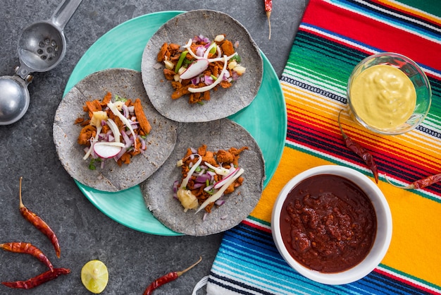 Photo mexican tacos on the table top view