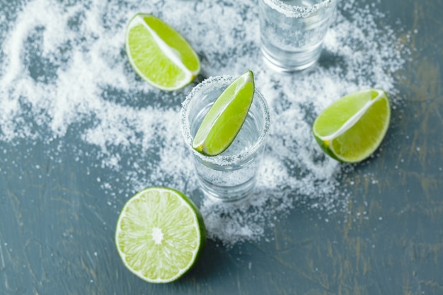 Mexican Tequila in short glasses with lime and salt