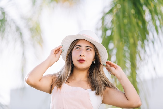 Mexican woman wearing hat, summer vacations