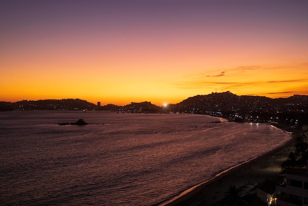 Mexico Acapulco resort beaches and sunset ocean views near Zona Dorada Golden Beach zone