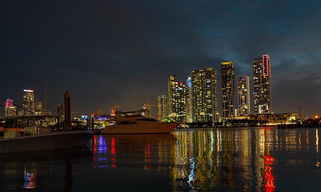 Miami city skyline panorama at dusk with urban skyscrapers and bridge over sea miami downtown view a