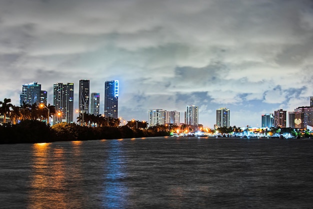 Miami City Skyline viewed from Biscayne Bay. Miami night downtown.