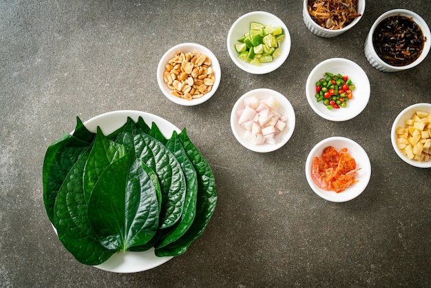 Miang kham - A royal leaf wrap appetizer - It is a traditional Southeast Asian snack from Thailand and Laos.