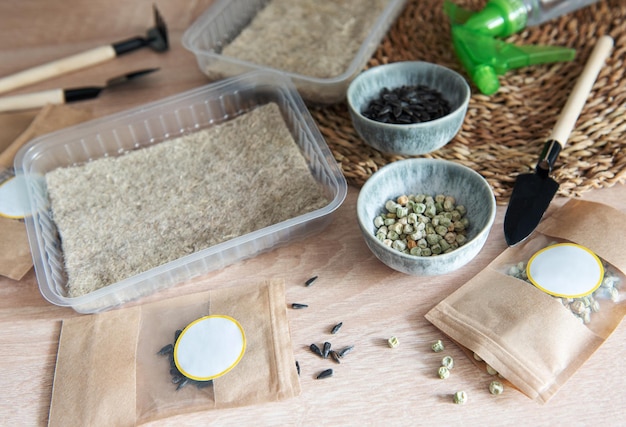 Microgreen seeds in paper bags and equipment for sowing microgreens