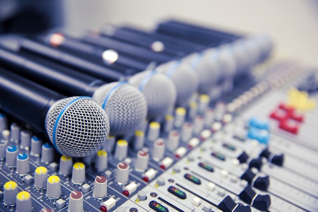 Microphone and Audio Mixer in Studio.