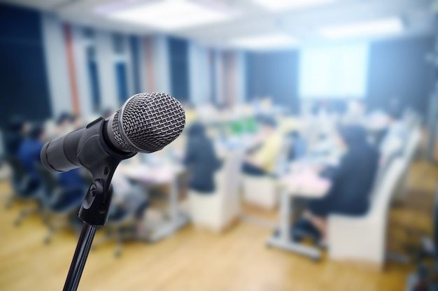 Microphone over the blurred business forum Meeting or Conference 