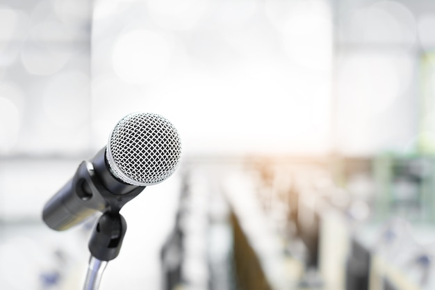 Microphone in conference on seminar room event background