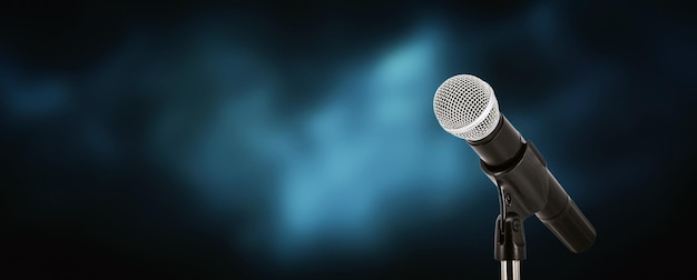 Microphone with stage light background for performance concept of speech comment and public speaking