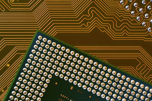 Microprocessor on the background of the microcircuit of the motherboard