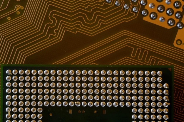 Microprocessor on the background of the microcircuit of the motherboard