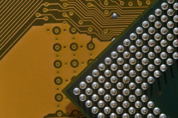 Microprocessor on the background of the microcircuit of the motherboard