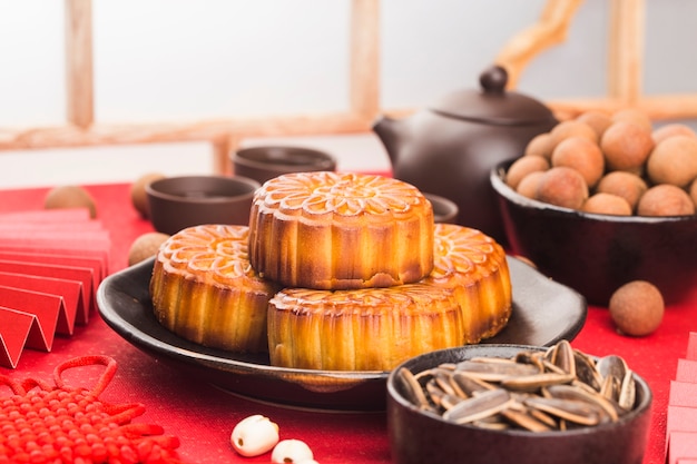 Mid-Autumn Festival concept, Traditional mooncakes on table  with teacup