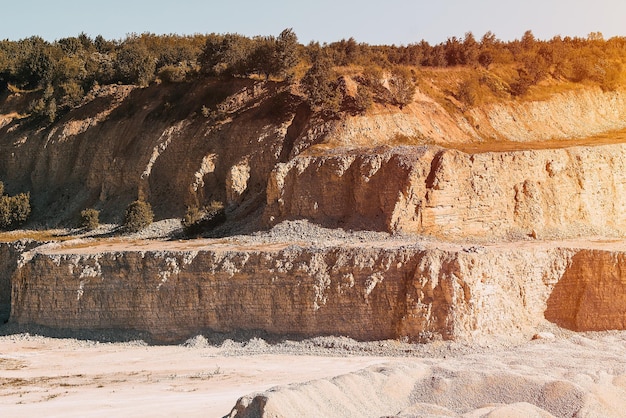 Midday light over a quarry landscape