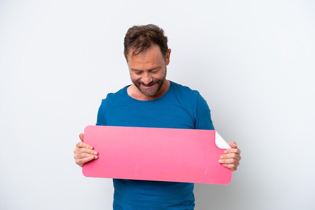 Photo middle age caucasian man isolated on white background holding an empty placard