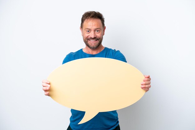 Photo middle age caucasian man isolated on white background holding an empty speech bubble