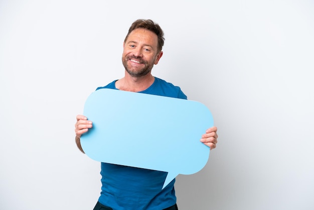 Photo middle age caucasian man isolated on white background holding an empty speech bubble