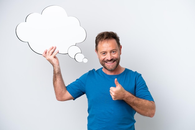 Middle age caucasian man isolated on white background holding a thinking speech bubble with thumb up