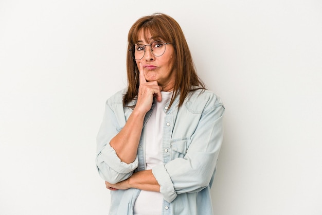 Middle age caucasian woman isolated on white background unhappy looking in camera with sarcastic expression.