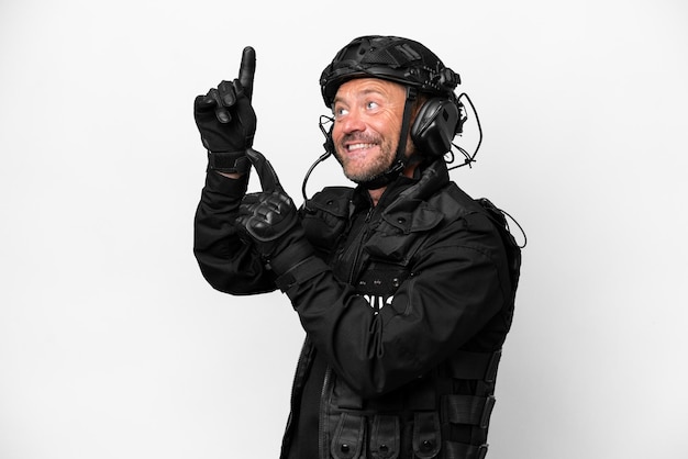 Middle age SWAT man isolated on white background pointing with the index finger a great idea