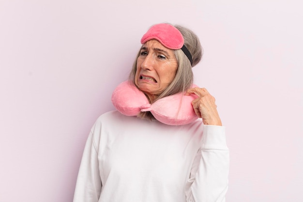 Middle age woman feeling stressed anxious tired and frustrated flight passenger concept