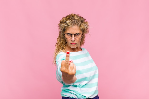 Photo middle age woman with long curly hair isolated