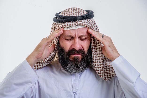 Middle Aged Arab Man having Headache