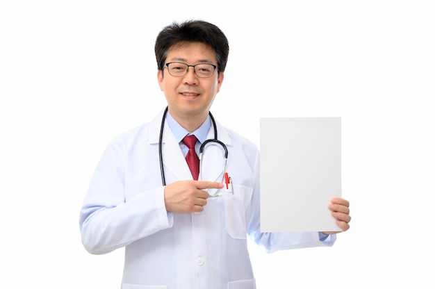 Middle-aged Asian doctor holding message board on white background.