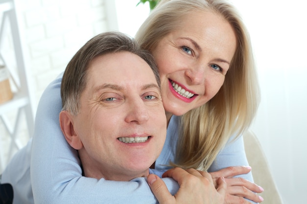 Middle aged Couple in an embrace portrait.