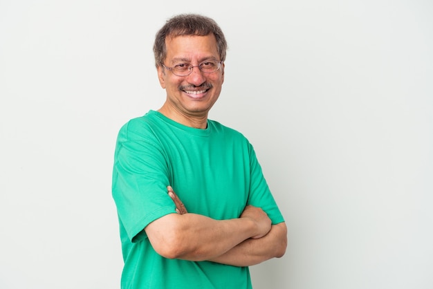 Middle aged indian man isolated on white background happy, smiling and cheerful.