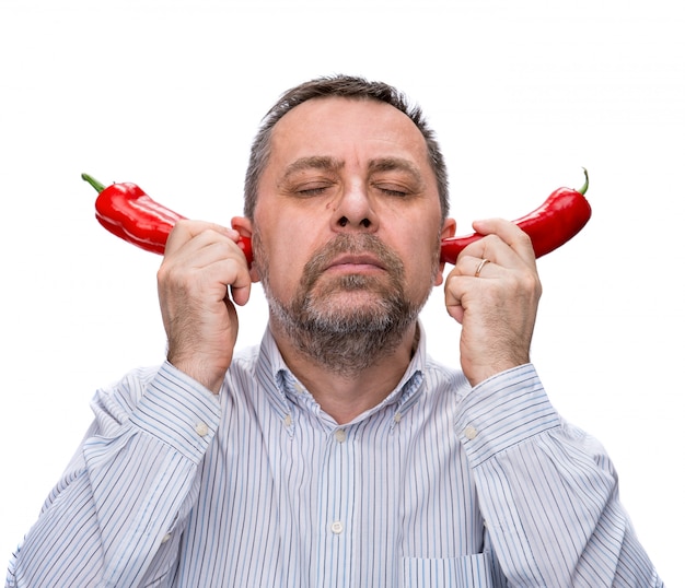 Middle-aged man with a red peppers