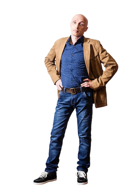 Middle aged man in a yellow jacket and blue jeans