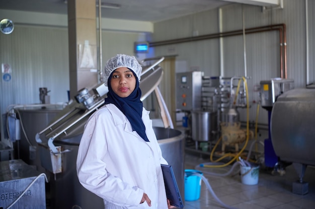 middle eastern black african muslim business woman in local  cheese production company