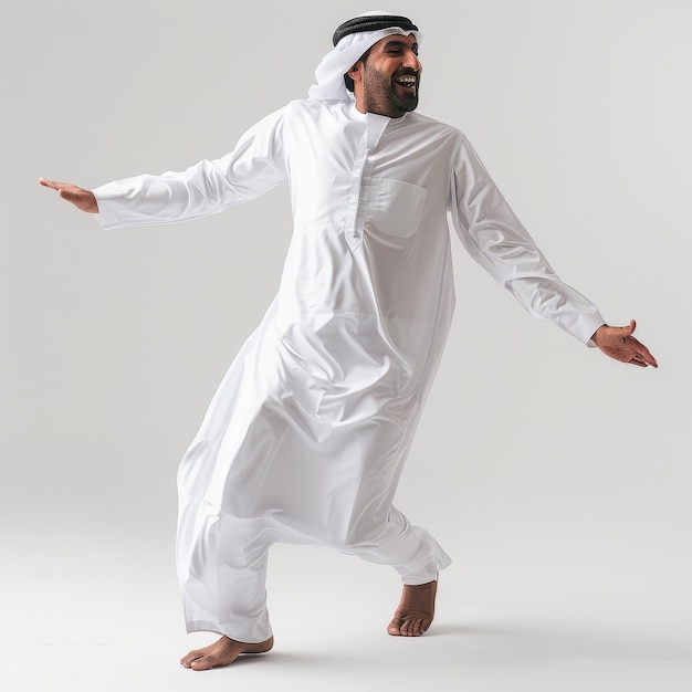 Middle Eastern Man in White Thobe Dancing in a Studio