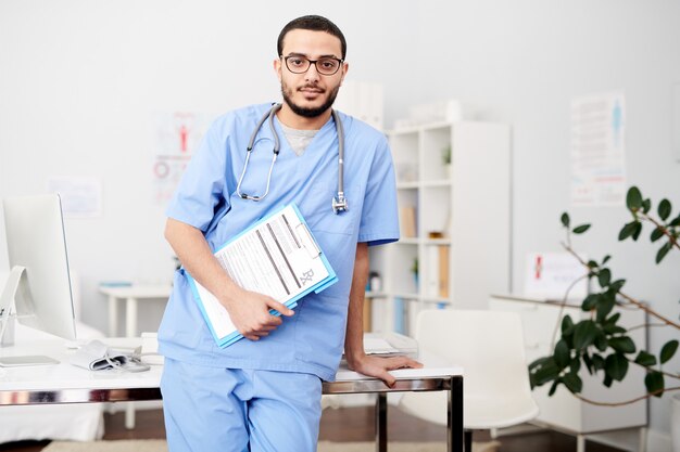 Middle-Eastern Physician Posing in Office