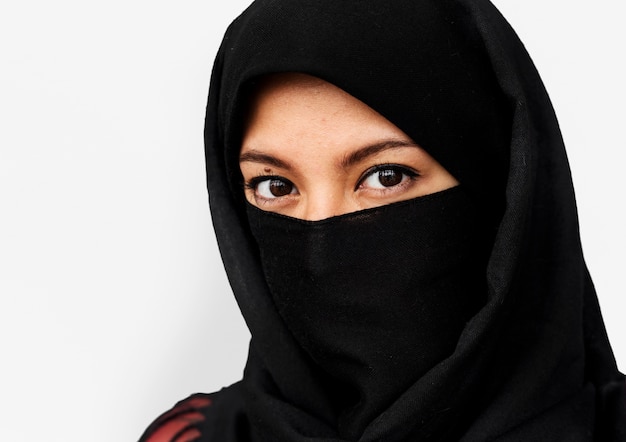 Middle eastern woman in hijab studio portrait