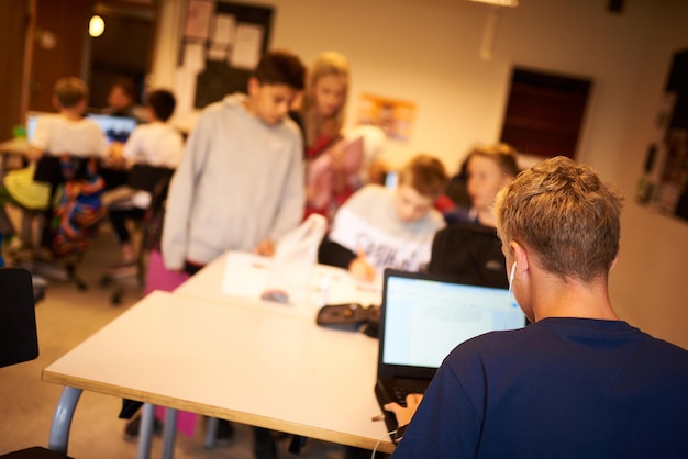 Middle school students learning in a classroom