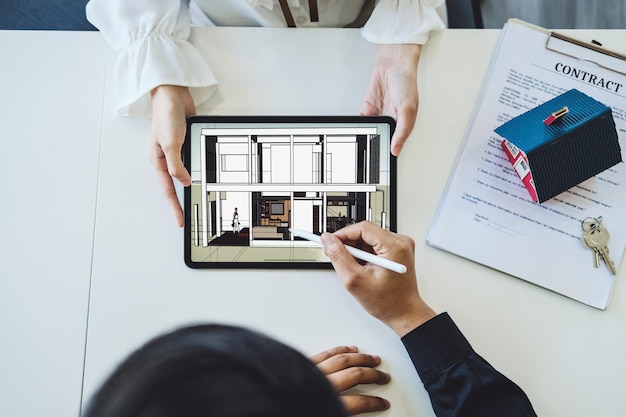 Photo midsection of man using digital tablet on table