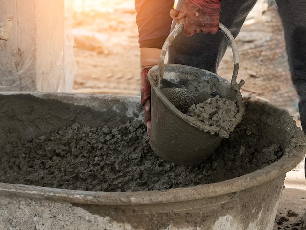 Photo midsection of man working at construction site