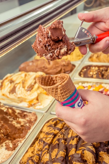 Photo midsection of person holding ice cream