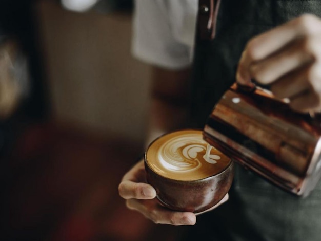 Midsection of woman holding coffee