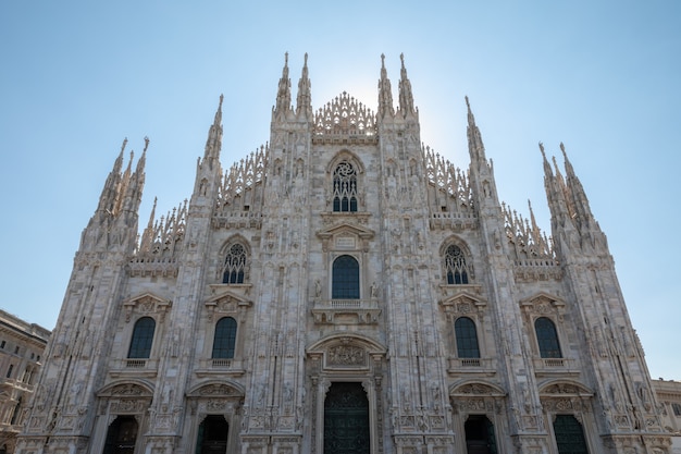 Milan, Italy - June 27, 2018: Panoramic view of exterior of Milan Cathedral (Duomo di Milano) is cathedral church of Milan. Dedicated to St Mary of Nativity, it is seat of the Archbishop of Milan