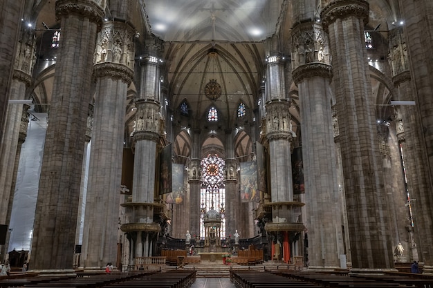 Milan, Italy - June 27, 2018: Panoramic view of interior of Milan Cathedral (Duomo di Milano) is cathedral church of Milan. Dedicated to St Mary of the Nativity, it is seat of the Archbishop of Milan