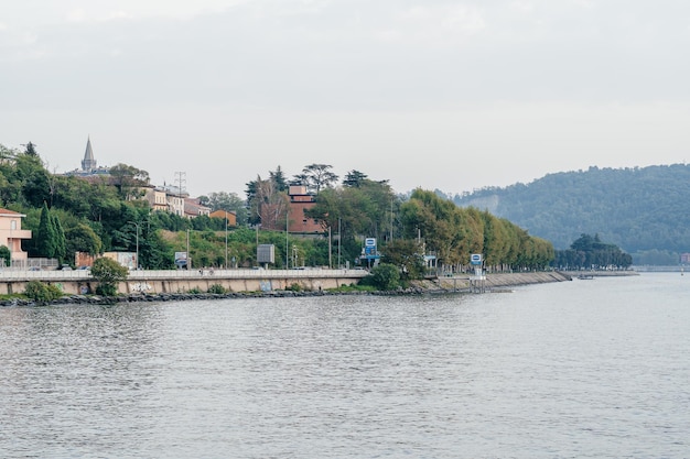 Milan Italy September 15 2021 embankment at Como lake with beautiful landscape scenery at Lecco travel destination in Lombardia