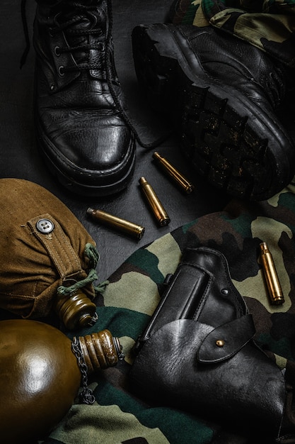 Military camouflage uniform and boots