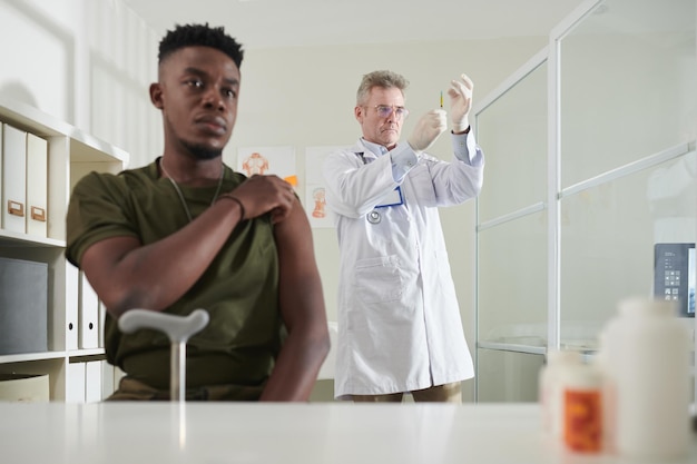 Military Man Getting Vaccine