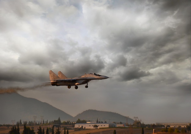 A military plane lands on the runway of a military airfield in Greece