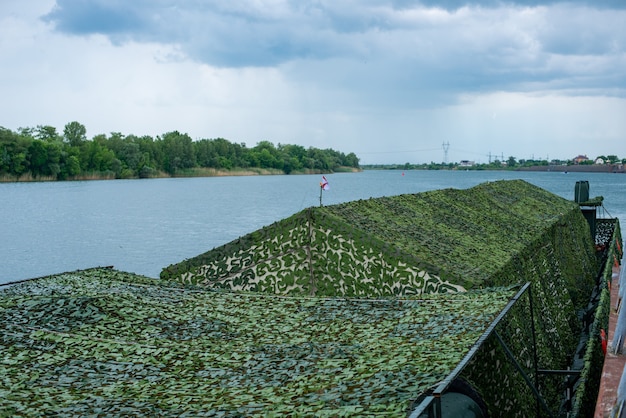 Military pontoonsships on bank of don river patriotic ferry rafting exhibition of naval military