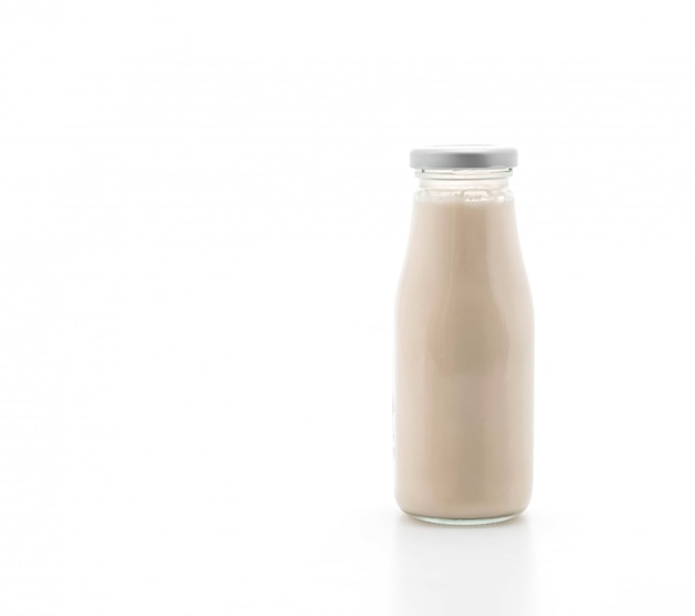 milk in bottle on white