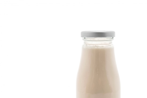 milk in bottle on white