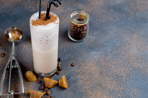 Milk chocolate cocktail or cold whipped coffee with milk